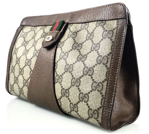 pochette gucci uomo prezzo|gucci pochette vintage.